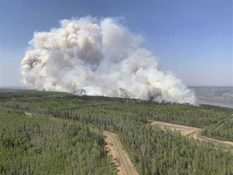 Out-of-control wildfires cause evacuations in western Canada : NPR