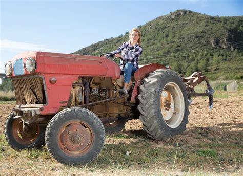 Female Farmer Working on Farm Tractor Stock Photo - Image of plantation, amateur: 195703046