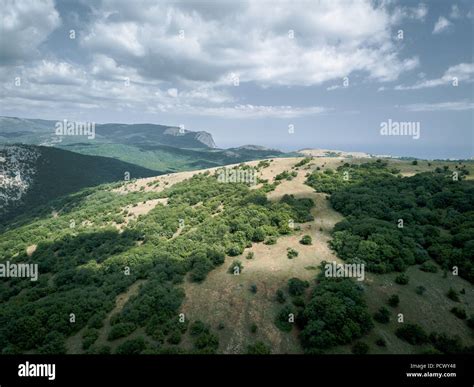 Aerial view mountains and sea from drone Stock Photo - Alamy