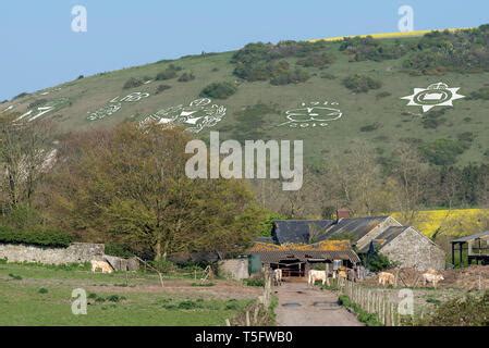 Fovant, Wiltshire, England, UK. April 2019. Regimental Fovant Badges carved into the chalk of ...