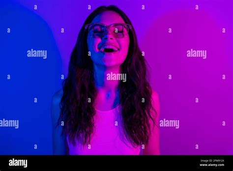 Photo of satisfied young person closed eyes toothy smile enjoy disco isolated on neon gradient ...