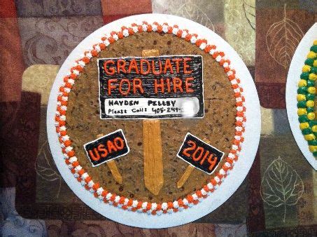 two cakes decorated to look like they have graduation decorations on them, one is for hire and ...