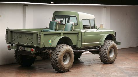 A Custom V8 Kaiser Jeep M715 Pickup Truck On 42" Super Swamper Tires