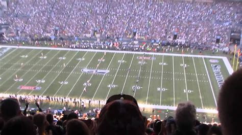 Raising the 12th Man flag, kicking off the 2014 NFL season - YouTube