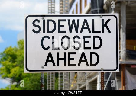 sidewalk closed sign at road pedestrian crossing miami south beach florida usa Stock Photo - Alamy