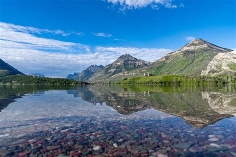 Driftwood Beach Wide Angle Shot with Colorful Rocks in Waterton Lakes National Park Canada Stock ...