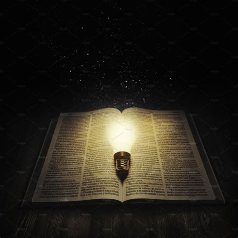 Light bulb lighting up an open bible | Stock Photos ~ Creative Market