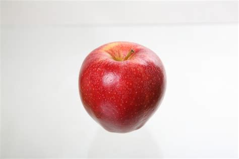 Premium Photo | Apple isolated in white background