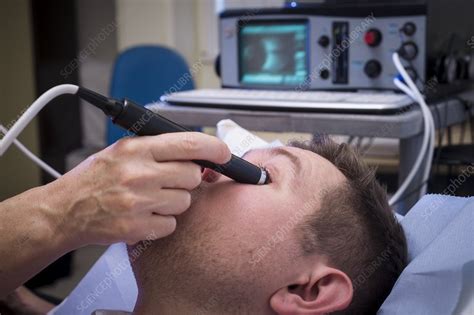 Ultrasound eye examination - Stock Image - C016/3775 - Science Photo Library