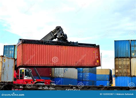 Shipping Container Loading by Richtracker on the Freight Rail Car at Logistic Warehouse Port ...