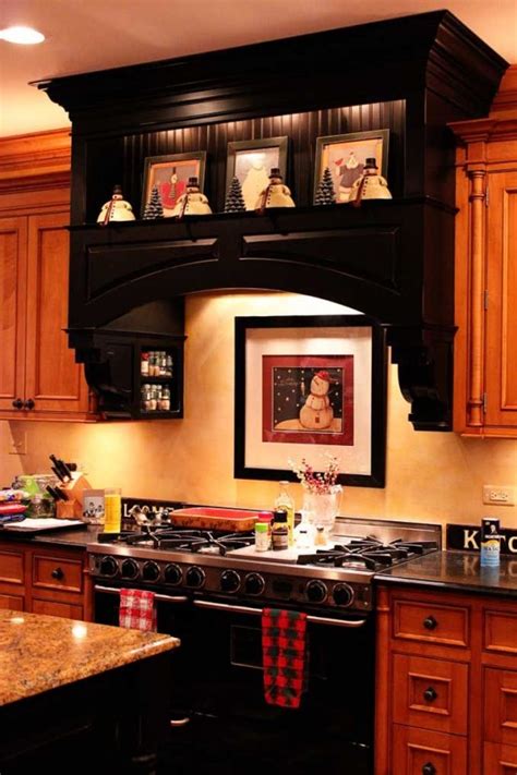 kitchen cabinet range hood design Hood range kitchen covered gold galley decor inspiration elle ...