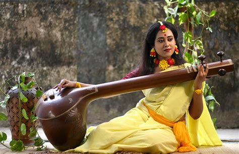 A woman playing Saraswati veena - PixaHive