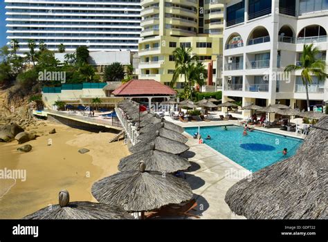 Swimming pool at condominium in Acapulco, Mexico Stock Photo - Alamy