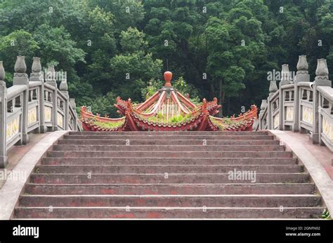 Arched steps of haoshang bridge leading towards a chinese gazebo in leshan china sichuan ...