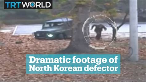 Dramatic video of North Korean soldier's defection - YouTube