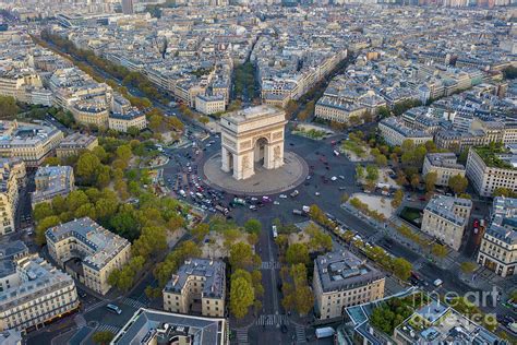 Over Paris Arc de Triomphe Dusk Light Photograph by Mike Reid