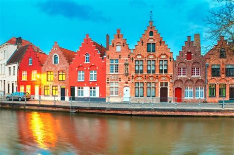 Premium Photo | Night bruges canal with beautiful colored houses