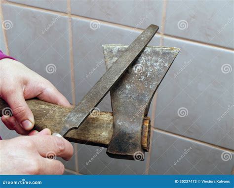 Sharpening an axe stock image. Image of close, edge, blade - 30237473