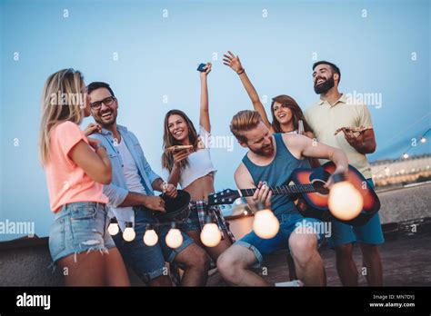 Friends having fun outdoors and are happy Stock Photo - Alamy