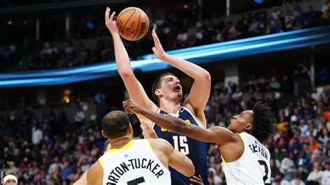 NBA: Nikola Jokic triple-double helps Denver Nuggets extend unbeaten start - BBC Sport