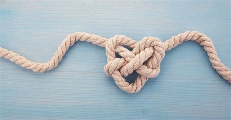 The Tie the Knot Meaning & Origin Story You Should Know