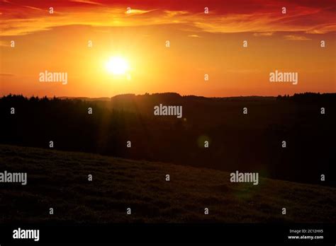 Sunrise over black forest mist Stock Photo - Alamy