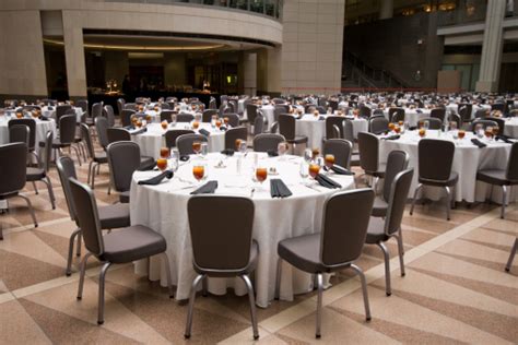 Large Room Set Up For A Banquet Round Tables Stock Photo - Download Image Now - iStock