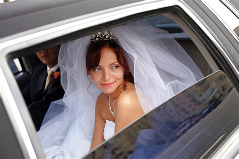 Smiling bride with groom in wedding limo | Charter Buses San Antonio and Austin | Student Buses ...