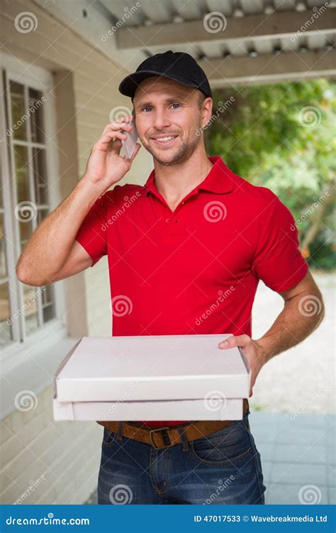 Happy Pizza Delivery Man on the Phone Stock Image - Image of caucasian, uniform: 47017533