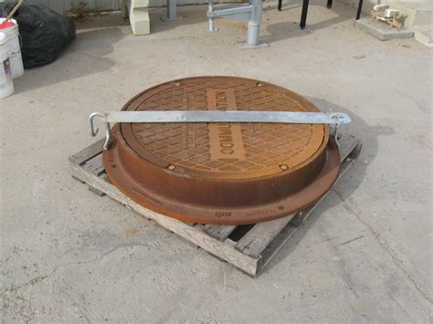 Manhole Riser with Lockbar Assembly — Vaughn Concrete Products