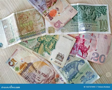 On the Table are Georgian Lari Banknotes of Various Categories. Stock ...