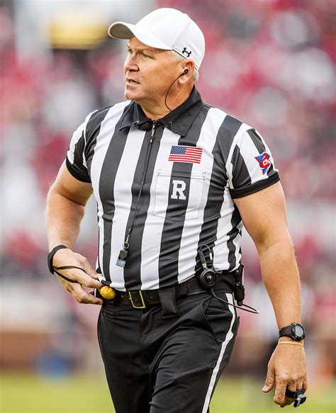 College Football Referee Mike Defee’s Buff Arms Steal the Show