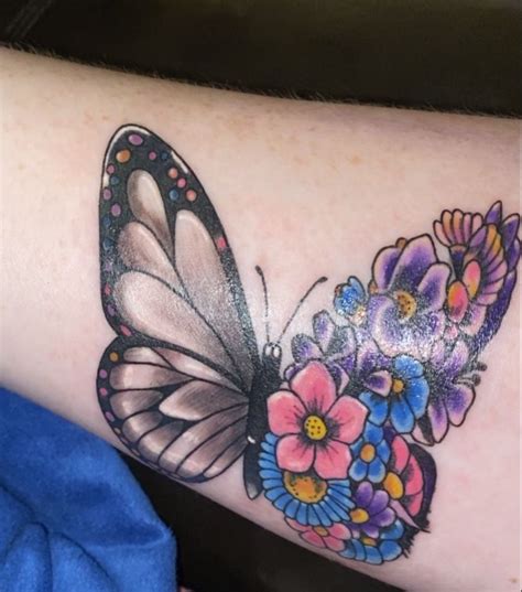 Colorful butterfly flower tattoo | Purple flower tattoos, Bright tattoos, Flower tattoo