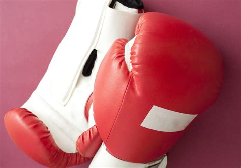 Free Stock Photo 10979 Close up Boxing Gloves on Dark Pink Background | freeimageslive