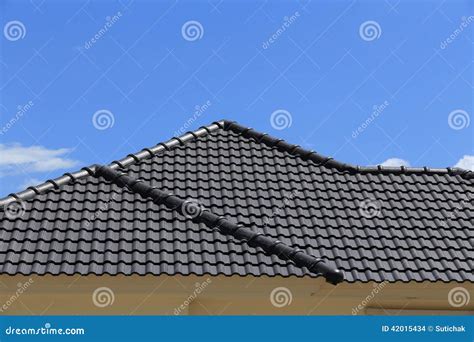 Black Tiles Roof on a New House Stock Photo - Image of background, building: 42015434