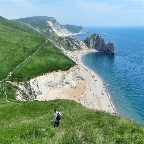 Hiking the Jurassic Coast in Dorset. Photo courtesy of mygreatescapes on Instagram. #howisummer ...