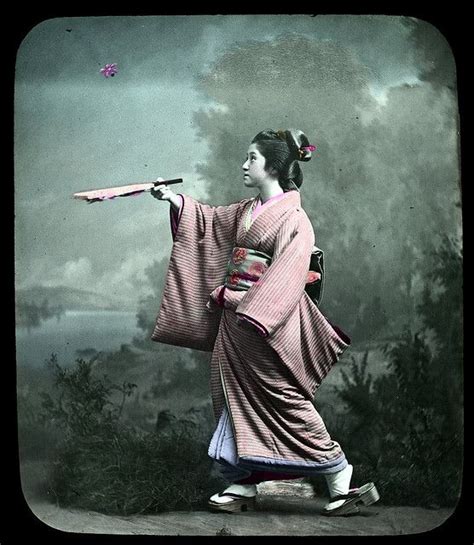 Hand tinted photograph of a young woman playing hanetsuki | Old photography, Japan culture ...