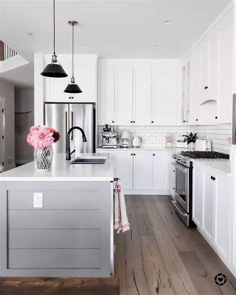 L-shaped White Kitchen Cabinets with White Countertops - Soul & Lane