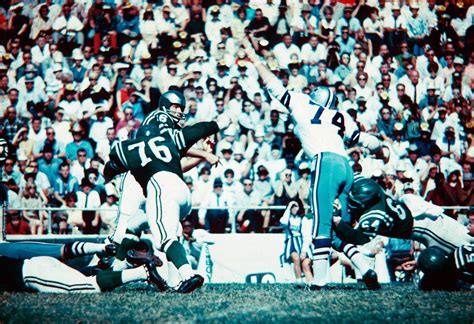 Bob Lilly pressures Eagles QB Norm Snead (16) in this 1966 game at the Cotton Bowl. Dallas ...