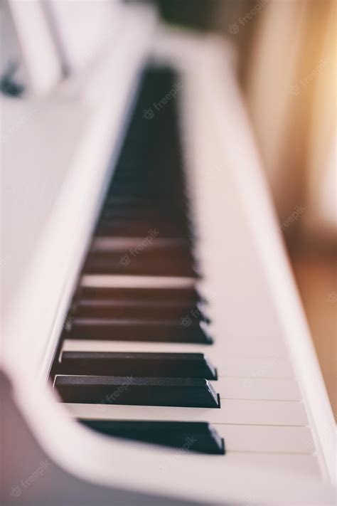 Premium Photo | Classic white piano keyboard