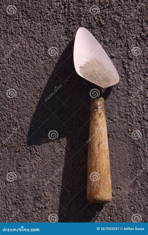 A Trowel is a Mandatory Tool Used by Builders To Level Cement Stock ...