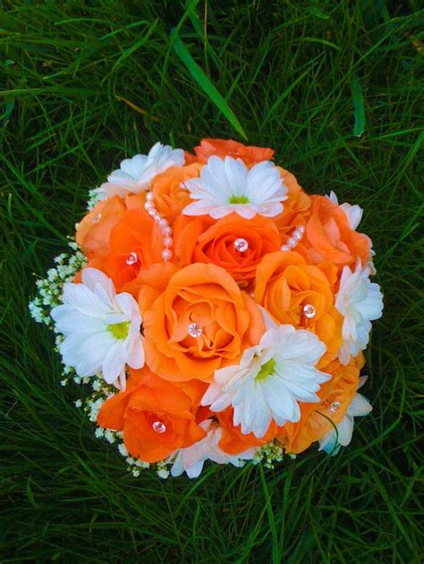 Orange bouquet - I kind of really like this minus the pearls and sparkles... | Orange bouquets ...