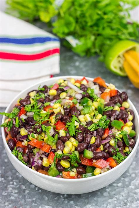 This Easy Black Bean Salad is a summer staple in our house. It's delicious as either a side dish ...