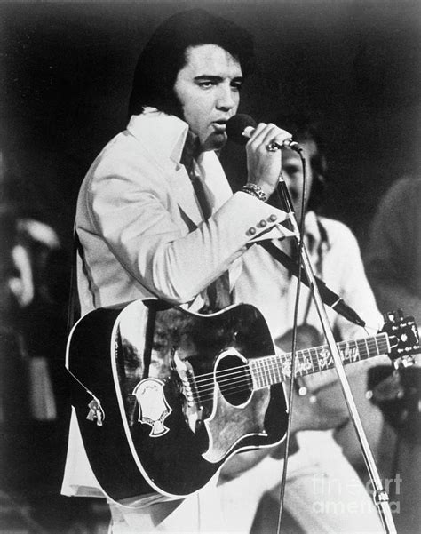 Elvis Presley Singing #1 by Bettmann