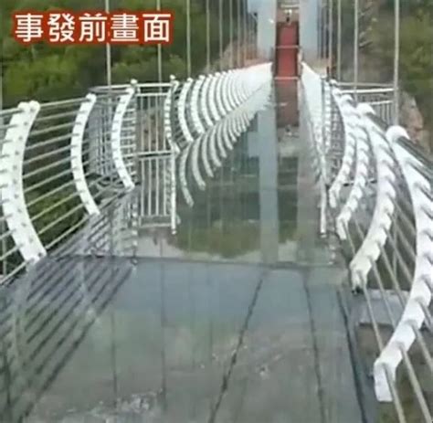 Terror after man left dangling from 100m-high glass bridge after floor collapsed - World News ...