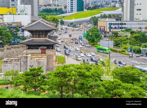 Downtown Seoul city skyline at Dongdaemun Gate, cityscape of South Korea at sunset Stock Photo ...