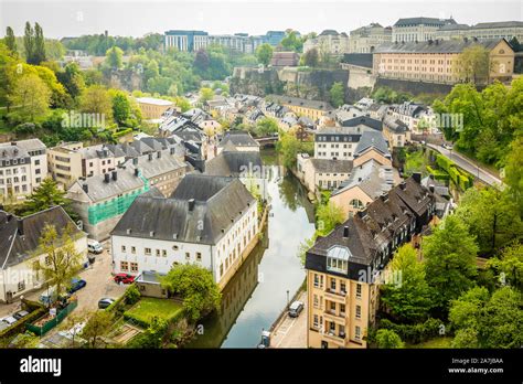 Alzette river bend with old houses along reflected in water Luxembourg city, Luxembourg Stock ...