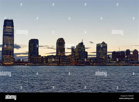 Jersey City skyline with skyscrapers at night over Hudson River Stock Photo: 89261617 - Alamy