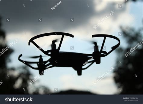 Drone Quadcopter Silhouette Flying Cloudy Sky Stock Photo 1168642726 | Shutterstock