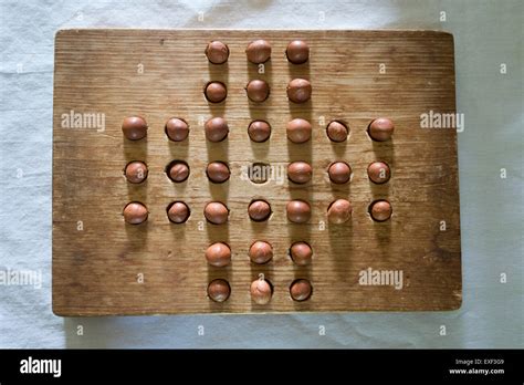 old vintage wooden board game nut Stock Photo - Alamy